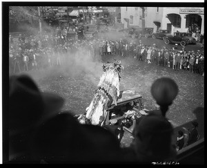 Puppeteers operating a dragon in a Chinese New Year celebration, Los Angeles