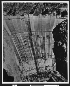 Construction of Boulder Dam, showing the back side of the dam, ca.1930