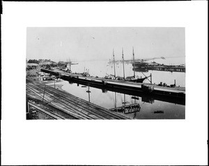 View of the inner harbor at San Pedro, showing a docked schooner