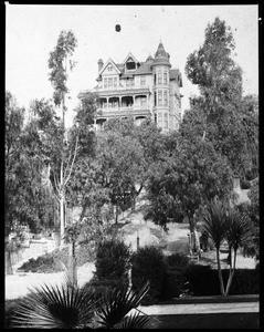 Exterior view of the Crocker mansion on the corner of Third Street and Olive Street in Los Angeles