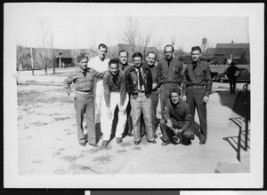 Group of men posing with pilot Douglas "Wrong Way" Corrigan, ca.1942