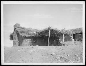 Cona Pena's house on hill near mission church. Indian hut on Warner's ranch