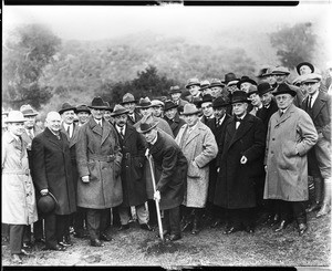 Group of men posing at the Mullholland Highway ground breaking ceremony, Los Angeles, 1923