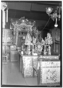 Interior view of the Kong Chew Temple in Los Angeles's old Chinatown, November 1933