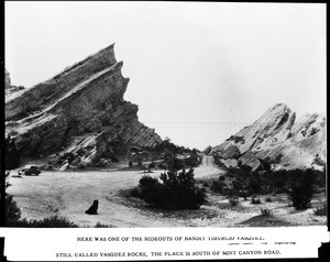 View of Vasquez Rocks, showing a dog and automobile south of Mint Canyon Highway