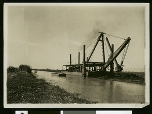 Dredger at work in an irrigation canal near El Centro, ca.1910