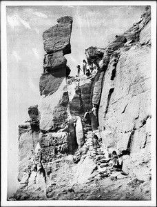 Children on the steps of the southeast trail to the Hopi pueblo of Walpi, on the First Mesa, Arizona, ca.1898