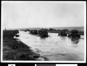 Flooded street looking south on Crenshaw from Exposition, January 1930