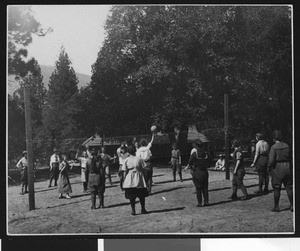 Young women playing volleyball, ca.1910