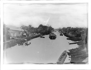 Small boats on a river, Manila, Philippines, ca.1900