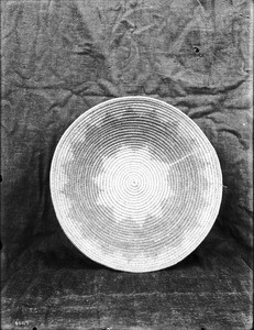 Unidentified Indian basket on display, ca.1900