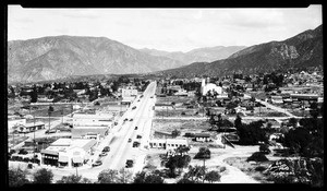 View of Sunset Boulevard (now Commerce Avenue) going north towards the San Gabriel Mountains, 1929