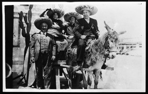 Four Mexican men on a roadway in Tijuana, Mexico