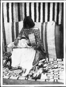 Young Walapai Indian mother with child on her lap, Hackbury, Arizona, ca.1900