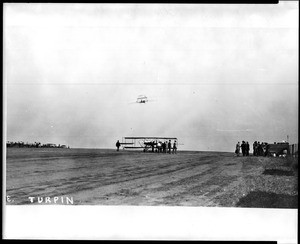 Aviator J. Clifford Turpin aloft with a passenger at the Dominguez Hills Air Meet, 1912