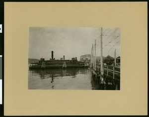 Oakland's Key Route Ferry Pier, showing a ferry boat, ca.1910