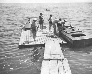 People on a floating dock in the Salton Sea, Date Palm Beach, ca.1940