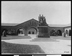 Statue of a family group at Stanford University, ca.1900