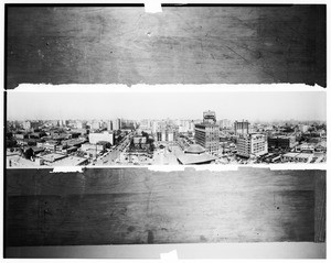 Panoramic view of downtown Los Angeles resting on a wooden table