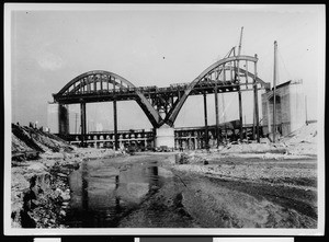 The 6th Street Viaduct under construction on the banks of Los Angeles River