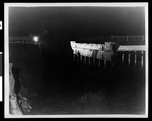 Flood damage to a bridge near the "Warner Bros. F.N. Studios", shown at night, 1938