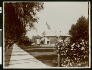 View of a large mansion on Orange Grove Avenue in Pasadena, looking south, ca.1920