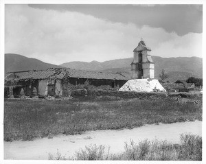 General view showing church and bell tower (campanario) of Mission Asistencia of San Antonio at Pala, ca.1890-1899