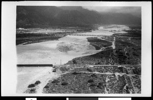 Flooded San Gabriel River looking northwest in Azusa, 1938