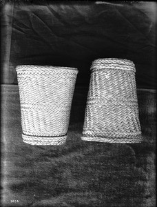 Two unidentified Indian baskets on display, ca.1900