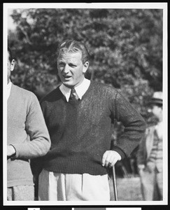 A close-up view of a golf player, ca.1920