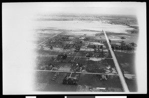 Aerial view of flooding near Dycer Airport, looking west, 1938