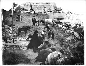 Hopi Snake Priests taking the emetic after the Snake Dance in the Hopi Indian village of Mishongnovi, ca.1901