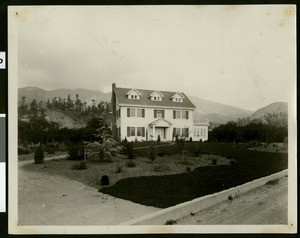 Monrovia residence viewed at a distance, perhaps belonging to Henry Waterman, ca.1920