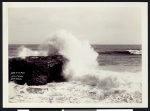 "Maid of the Mist" in Santa Cruz, showing a wave crashing against a rock, ca.1900