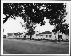 National-style homes along an unidentified street, ca.1940-1949