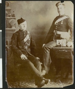 Two soldiers in uniform indoors, possibly Prussian, during World War I, ca.1914