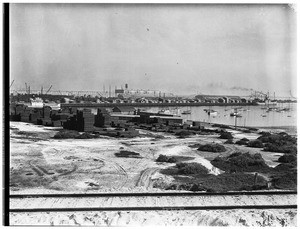 Lumber yard at an unidentified harbor