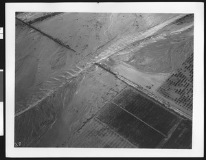 Aerial view of flooding of a railroad bridge "north of Olive", ca.1930