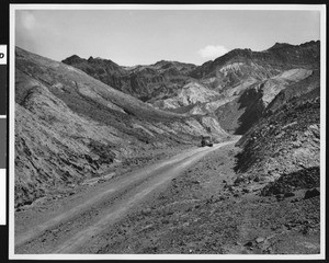 Automobile on Artist(?) Drive in Death Valley, ca.1900-1950