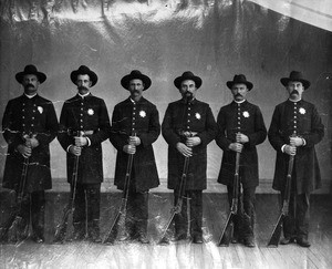 Portrait of the Los Angeles Police team, posing with rifles, 1890