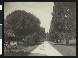 Two young girls on Capitol grounds in Sacramento, ca.1900