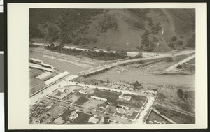 Aerial view of flooding of the Black (Dark?) Canyon Bridge near Warner Brothers Studio, ca.1930