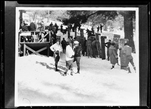 Tobogganists climbing a slope at Big Pines camp, 1928