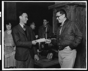 Los Angeles Open Golf Tournament winner, Densmore Shute, receiving a check, 1930