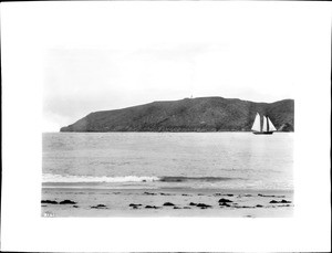 View of Point Loma with schooner on water, ca.1895