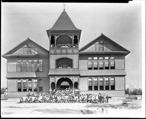 Children and teachers posing in front of Santa Paula Grammar School, ca.1900