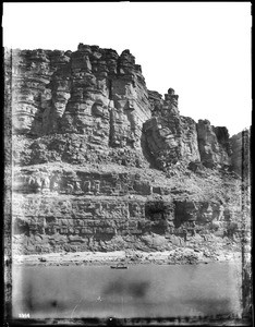 Small boat crossing the Colorado River in Marble Canyon, Grand Canyon, 1900-1930