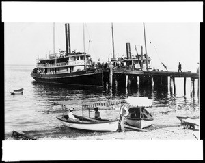 View of Avalon Harbor at Santa Catalina Island, showing docked steamers and other boats, ca.1900