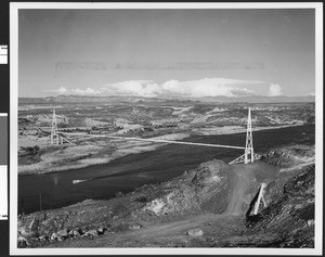 Pipeline across a river, ca. 1955