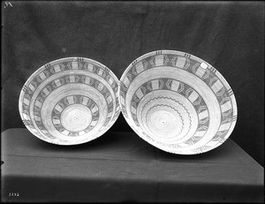 Two Indian baskets on display, ca.1900